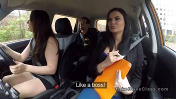 Threesome in fake driving school car